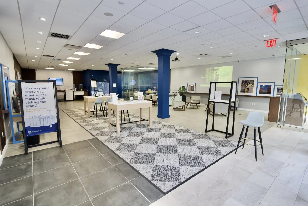 Ponce Bank branch lobby with navy columns